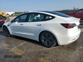 2022 Tesla Model 3 Long Range with VIN 5YJ3E1EB2NF199141, listed as a Copart auction lot 53069145 with 67,140 mi miles and Non Repairable. Bid and sale history available at DreamBid. Image 2.