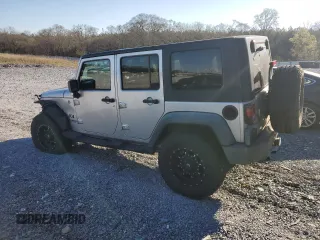 2009 Jeep Wrangler Unlimited X with VIN 1J4GA39179L756228, listed as a Copart auction lot 50086445 with 158,274 mi miles and Salvage Title. Bid and sale history available at carsss.com. Image 2.