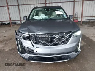 2022 Cadillac XT6 Premium Luxury z VIN 1GYKPDRS1NZ108012, wystawiony jako IAAI lot #41178333 z przebiegiem 83 987 mil mil oraz . Historia ofert i sprzedaży dostępna na DreamBid. Obrazek 12.