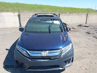 2018 Honda Odyssey EX-L z VIN 5FNRL6H79JB041040, wystawiony jako IAAI lot #41883128 z przebiegiem Nie podano mil oraz . Historia ofert i sprzedaży dostępna na DreamBid. Obrazek 6.