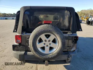 2016 Jeep Wrangler Willys Wheeler with VIN 1C4AJWAG5GL266235, listed as a Copart auction lot 50237195 with 60,830 mi miles and Salvage title. Bid and sale history available at DreamBid. Image 6.