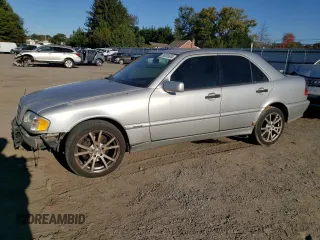 2000 Mercedes-Benz C 230 Kompressor with VIN WDBHA24G5YF935573, listed as a Copart auction lot 76331604 with 261,917 mi miles and Salvage Title. Bid and sale history available at carsss.com. Image 1.