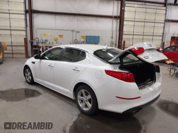 2015 Kia Optima LX with VIN KNAGM4A74F5587995, listed as a IAAI auction lot 41974745 with 206,627 mi miles. Bid and sale history available at carsss.com. Image 3.