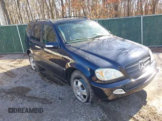 2004 Mercedes-Benz M-Class 3.5L with VIN 4JGAB57E74A468252, listed as a IAAI auction lot 41706046 with 126,119 mi miles. Bid and sale history available at carsss.com. Image 1.