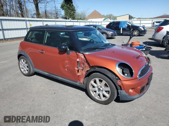 2011 MINI Hardtop S with VIN WMWSV3C57BTY11831, listed as a Copart auction lot 51985845 with 70,690 mi miles and Salvage Title. Bid and sale history available at DreamBid. Image 4.