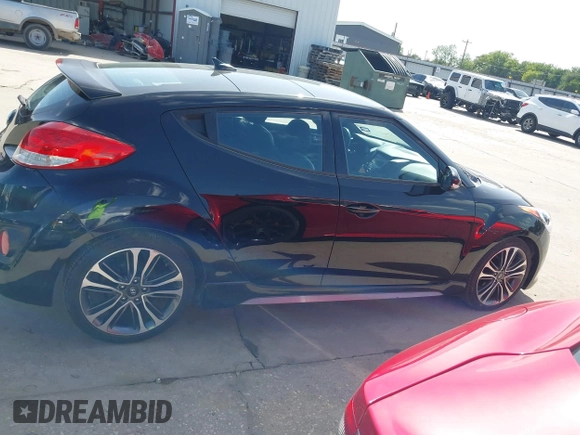 2016 Hyundai Veloster Turbo z VIN KMHTC6AE7GU255020, wystawiony jako IAAI lot #42720287 z przebiegiem 89 629 mil mil oraz . Historia ofert i sprzedaży dostępna na DreamBid. Obrazek 14.