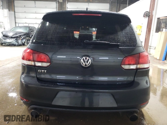 2013 Volkswagen GTI с VIN WVWGD7AJXDW129840, выставлен на аукционе Copart как лот 52946845 с пробегом 118 520 миль миль и Списание • Salvage title. История ставок и продаж доступна на DreamBid. Изображение 6.