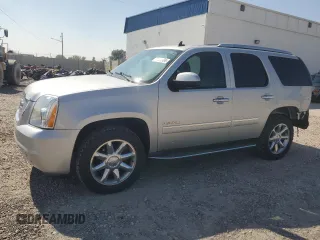 2014 GMC Yukon Denali with VIN 1GKS2EEF8ER140799, listed as a Copart auction lot 69584934 with 79,670 mi miles and Salvage Title. Bid and sale history available at carsss.com. Image 1.