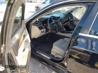 2015 Cadillac CTS RWD with VIN 1G6AP5SX8F0140364, listed as a IAAI auction lot 42535236 with 126,277 mi miles and . Bid and sale history available at DreamBid. Image 5.