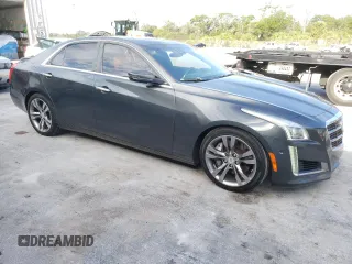 2014 Cadillac CTS Vsport Premium RWD z VIN 1G6AV5S80E0171279, wystawiony jako Copart lot #63759434 z przebiegiem 129 154 mil mil oraz Szkody całkowita. Historia ofert i sprzedaży dostępna na DreamBid. Obrazek 4.