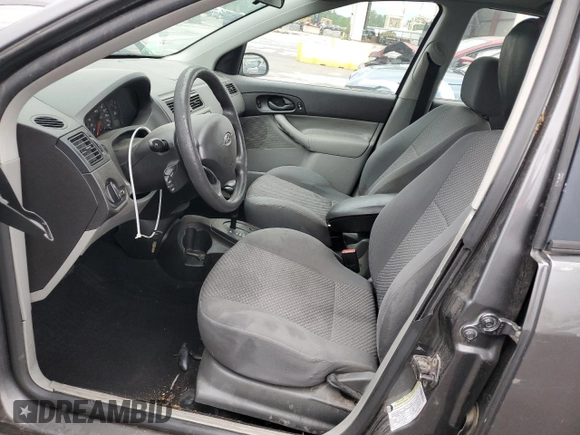 2005 Ford Focus S with VIN 3FAFP37N75R120187, listed as a Copart auction lot 57390605 with 163,547 mi miles and Salvage title. Bid and sale history available at DreamBid. Image 7.