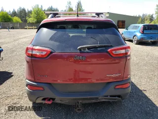 2014 Jeep Cherokee Trailhawk с VIN 1C4PJMBS8EW268056, выставлен на аукционе Copart как лот 54951885 с пробегом 111 678 миль миль и Списание • Salvage title. История ставок и продаж доступна на DreamBid. Изображение 6.