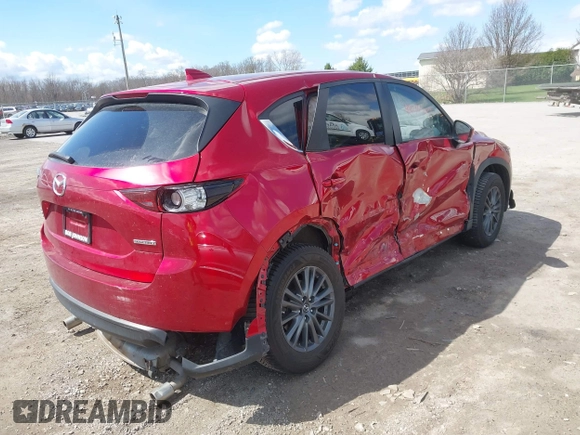 2021 Mazda CX-5 Touring z VIN JM3KFBCM1M0401717, wystawiony jako IAAI lot #42036407 z przebiegiem 35 587 mil mil oraz . Historia ofert i sprzedaży dostępna na DreamBid. Obrazek 4.