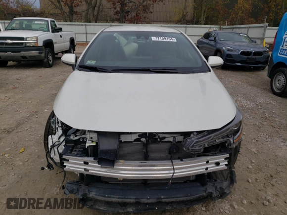 2019 Toyota Corolla Hatchback SE with VIN JTNK4RBEXK3051691, listed as a Copart auction lot 77159164 with 21,051 mi miles and Salvage Title. Bid and sale history available at carsss.com. Image 5.