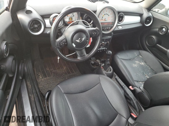 2014 MINI Convertible with VIN WMWZN3C53ET861225, listed as a Copart auction lot 87791665 with 104,151 mi miles and Salvage title. Bid and sale history available at DreamBid. Image 8.