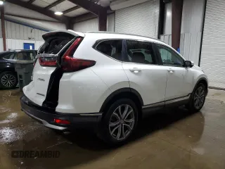 2021 Honda CR-V Touring z VIN 5J6RW2H96ML015699, wystawiony jako Copart lot #60616475 z przebiegiem 46 297 mil mil oraz Szkoda całkowita • Salvage title. Historia ofert i sprzedaży dostępna na DreamBid. Obrazek 3.