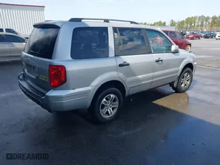 2003 Honda Pilot EX with VIN 2HKYF18613H539217, listed as a IAAI auction lot 41696214 with 329,118 mi miles. Bid and sale history available at carsss.com. Image 4.