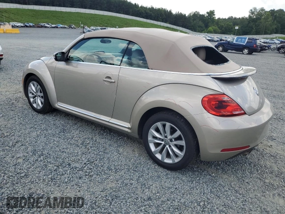 2015 Volkswagen Beetle with VIN 3VW5A7AT9FM815899, listed as a Copart auction lot 63074125 with 77,214 mi miles and Salvage title. Bid and sale history available at DreamBid. Image 2.
