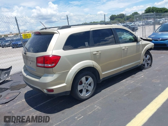 2011 Dodge Journey Mainstreet with VIN 3D4PH1FG9BT565356, listed as a IAAI auction lot 42808442 with 202,574 mi miles and . Bid and sale history available at DreamBid. Image 4.