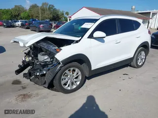 2019 Hyundai Tucson Value with VIN KM8J33A42KU024497, listed as a IAAI auction lot 41607693 with 70,792 mi miles. Bid and sale history available at carsss.com. Image 18.