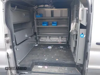2020 Ford Transit Cargo z VIN 1FTYE1Y80LKB53684, wystawiony jako IAAI lot #42556377 z przebiegiem 102 801 mil mil oraz . Historia ofert i sprzedaży dostępna na DreamBid. Obrazek 8.