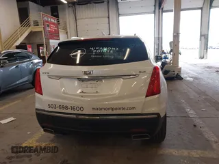 2017 Cadillac XT5 FWD with VIN 1GYKNARS7HZ121596, listed as a IAAI auction lot 41825879 with 82,023 mi miles and . Bid and sale history available at DreamBid. Image 17.