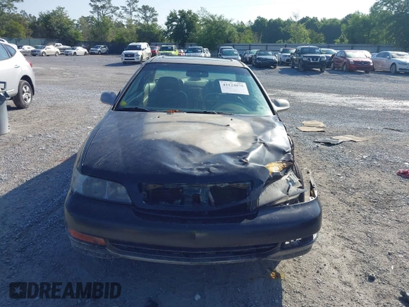1999 Acura CL Premium z VIN 19UYA2255XL014474, wystawiony jako IAAI lot #42124075 z przebiegiem 212 404 mil mil oraz . Historia ofert i sprzedaży dostępna na DreamBid. Obrazek 11.