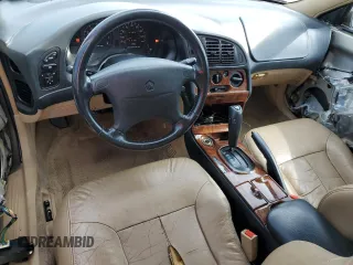 1999 Chrysler Sebring LXi z VIN 4C3AU52N9XE040835, wystawiony jako Copart lot #73418654 z przebiegiem 113 640 mil mil oraz Szkody całkowita. Historia ofert i sprzedaży dostępna na DreamBid. Obrazek 8.