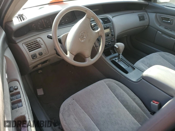 2004 Toyota Avalon XL z VIN 4T1BF28B74U351295, wystawiony jako Copart lot #78364424 z przebiegiem 129 130 mil mil oraz Szkoda całkowita • Salvage title. Historia ofert i sprzedaży dostępna na DreamBid. Obrazek 8.