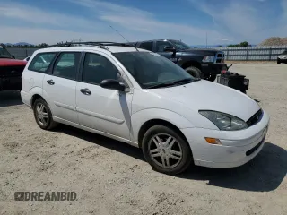 2000 Ford Focus SE with VIN 1FAFP36P0YW247559, listed as a Copart auction lot 60351255 with 107,774 mi miles and Clean title. Bid and sale history available at DreamBid. Image 4.