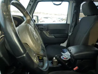 2018 Jeep Wrangler JK Unlimited Sport S with VIN 1C4BJWDG2JL846307, listed as a Copart auction lot 87287374 with 0 mi miles and Salvage Title. Bid and sale history available at carsss.com. Image 7.
