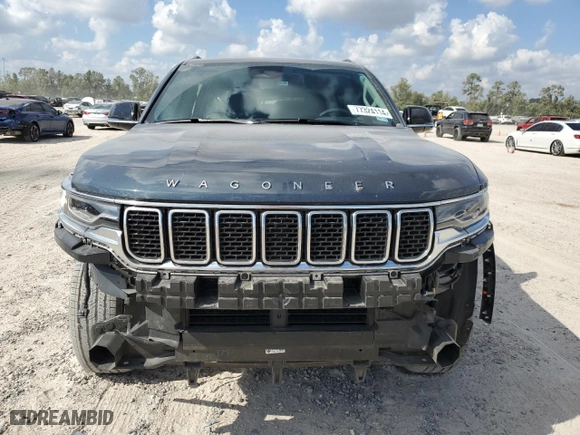 2024 Jeep Wagoneer with VIN 1C4SJVAP9RS114983, listed as a Copart auction lot 77324114 with 22,441 mi miles and Salvage Title. Bid and sale history available at carsss.com. Image 5.