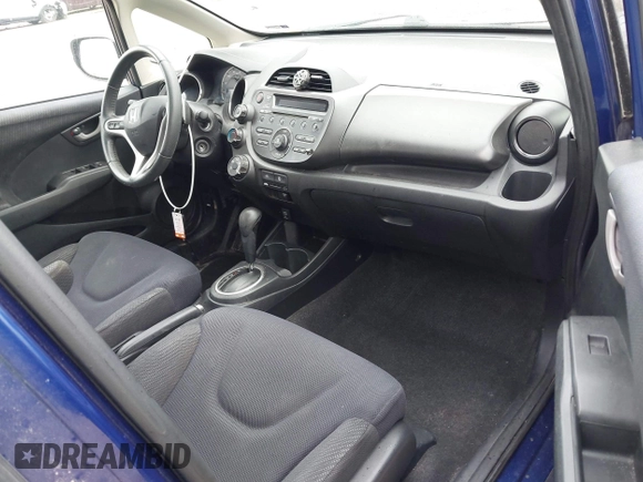 2012 Honda Fit Sport with VIN JHMGE8H50CC001195, listed as a IAAI auction lot 42083901 with 149,303 mi miles and . Bid and sale history available at DreamBid. Image 5.