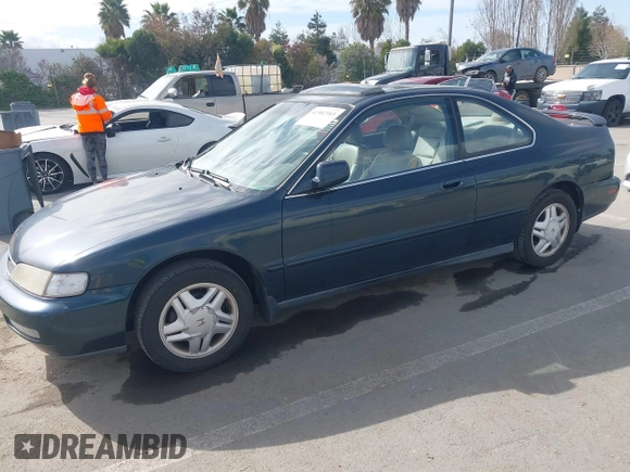 1997 Honda Accord EX with VIN 1HGCD7158VA014025, listed as a IAAI auction lot 41582343 with 302,660 mi miles and . Bid and sale history available at carsss.com. Image 2.