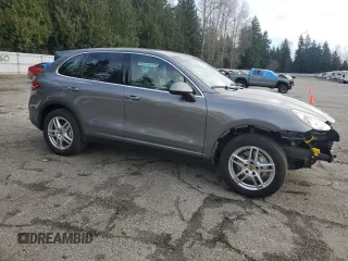 2014 Porsche Cayenne S with VIN WP1AB2A21ELA59007, listed as a Copart auction lot 47820385 with 69,924 mi miles and Salvage title. Bid and sale history available at DreamBid. Image 4.