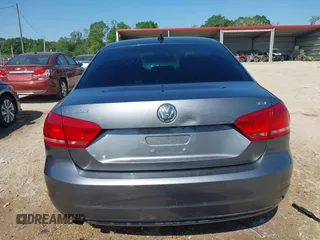 2015 Volkswagen Passat 1.8T Wolfsburg Ed with VIN 1VWAT7A3XFC115934, listed as a IAAI auction lot 41948035 with 243,143 mi miles. Bid and sale history available at carsss.com. Image 17.