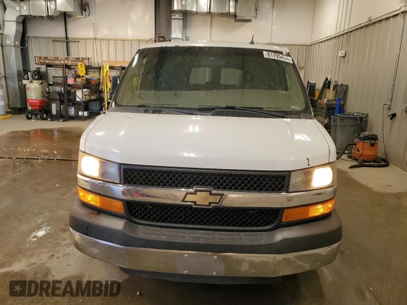 2013 Chevrolet Express Passenger LT with VIN 1GAZG1FG5D1118406, listed as a Copart auction lot 81705434 with 87,326 mi miles and Salvage title. Bid and sale history available at DreamBid. Image 5.