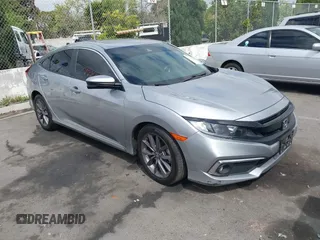2021 Honda Civic EX-L z VIN 19XFC1F71ME205643, wystawiony jako IAAI lot #42047532 z przebiegiem 63 247 mil mil oraz . Historia ofert i sprzedaży dostępna na DreamBid. Obrazek 1.