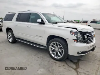 2018 Chevrolet Suburban Premier with VIN 1GNSCJKC5JR184384, listed as a Copart auction lot 53512255 with 161,503 mi miles and Salvage title. Bid and sale history available at DreamBid. Image 4.