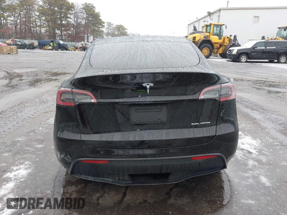 2023 Tesla Model Y Long Range with VIN 7SAYGDEE8PA183301, listed as a IAAI auction lot 41498769 with 82,893 mi miles and . Bid and sale history available at carsss.com. Image 16.