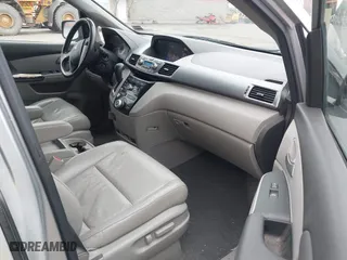 2011 Honda Odyssey EX-L with VIN 5FNRL5H65BB047291, listed as a IAAI auction lot 42094374 with 200,372 mi miles. Bid and sale history available at carsss.com. Image 5.