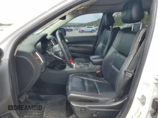 2018 Dodge Durango с VIN NY76958, выставлен на аукционе Copart как лот 55122245 с пробегом 102 413 миль миль и Списание • Salvage title. История ставок и продаж доступна на DreamBid. Изображение 7.