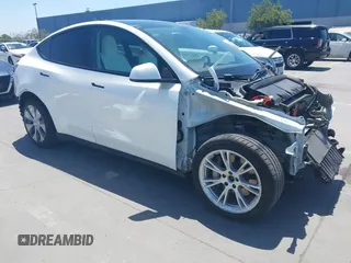 2021 Tesla Model Y Long Range z VIN 5YJYGDEE2MF225098, wystawiony jako IAAI lot #42171954 z przebiegiem 42 874 mil mil oraz . Historia ofert i sprzedaży dostępna na DreamBid. Obrazek 1.