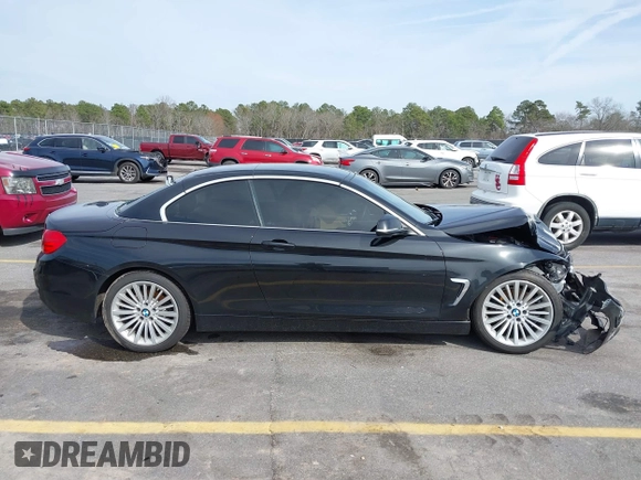 2014 BMW 4 Series 428i with VIN WBA3V5C59EP747773, listed as a IAAI auction lot 41617565 with 65,288 mi miles and . Bid and sale history available at DreamBid. Image 13.