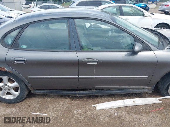 2003 Ford Taurus SE Standard with VIN 1FAFP53U43A233028, listed as a IAAI auction lot 42624211 with 65,364 mi miles and . Bid and sale history available at DreamBid. Image 13.