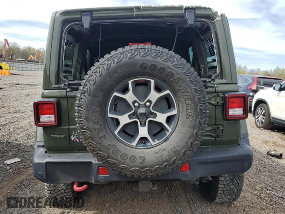 2021 Jeep Wrangler Unlimited Rubicon with VIN 1C4JJXFM3MW555919, listed as a Copart auction lot 54319775 with 51,188 mi miles and Salvage title. Bid and sale history available at DreamBid. Image 6.