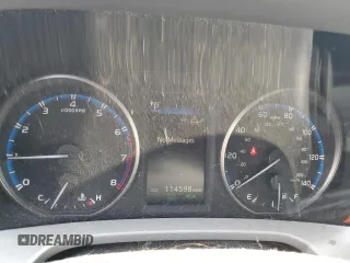 2018 Toyota RAV4 XLE with VIN 2T3RFREV0JW765995, listed as a Copart auction lot 63968785 with 114,598 mi miles and Salvage title. Bid and sale history available at DreamBid. Image 9.