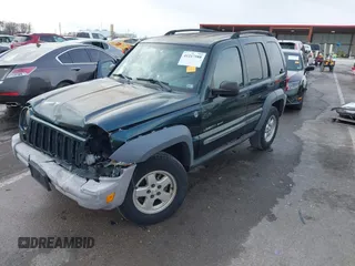 2005 Jeep Liberty Sport with VIN 1J4GL48K15W631101, listed as a IAAI auction lot 41217588 with 168,378 mi miles. Bid and sale history available at carsss.com. Image 2.