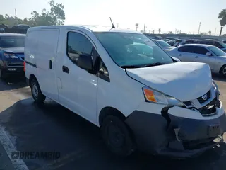 2015 Nissan NV200 SV with VIN 3N6CM0KN0FK730306, listed as a IAAI auction lot 41642872 with 128,344 mi miles. Bid and sale history available at carsss.com. Image 1.