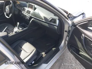 2018 BMW 3 Series 320i with VIN WBA8A9C55JAH14990, listed as a IAAI auction lot 41719896 with 77,472 mi miles. Bid and sale history available at carsss.com. Image 5.
